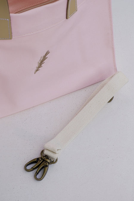 Pink bag with a sprig embroidery detail 